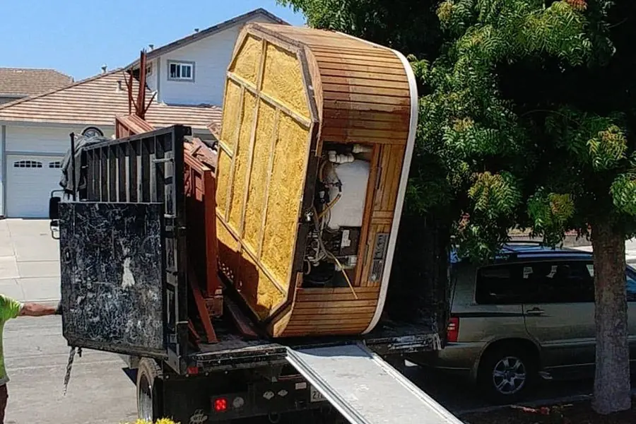 Hot tub shell loaded onto a Left Coast Hauling truck